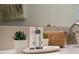 Close up of bathroom with white countertop, decorative plants and essential products at 4974 Windermere Ave, Kissimmee, FL 34746