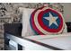 Detailed image of the bedroom decor highlighting unique Marvel comic-themed wallpaper at 4974 Windermere Ave, Kissimmee, FL 34746