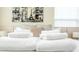 Inviting bedroom features plush bedding and serene Paris-themed artwork, creating a peaceful retreat at 4974 Windermere Ave, Kissimmee, FL 34746