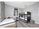Fun bedroom featuring bunk beds, Marvel themed decor, and sleek, modern flooring at 4974 Windermere Ave, Kissimmee, FL 34746