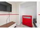 Corner of a bedroom with a dresser and a TV at 4974 Windermere Ave, Kissimmee, FL 34746