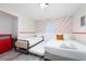 bedroom with two beds and Mickey Mouse themed decor at 4974 Windermere Ave, Kissimmee, FL 34746