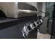 Outdoor grill with control panel, set in a patio, ideal for barbecue gatherings at 4974 Windermere Ave, Kissimmee, FL 34746