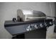 Close-up of a stainless steel grill, perfect for outdoor cooking and entertaining at 4974 Windermere Ave, Kissimmee, FL 34746