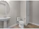 Powder room features pedestal sink at 5029 Hartwell Ct, St Cloud, FL 34771