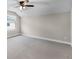 Bright bedroom featuring a ceiling fan and a window with natural light at 5029 Hartwell Ct, St Cloud, FL 34771