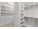 Organized walk-in closet with custom shelves, drawers, and hanging rods at 5029 Hartwell Ct, St Cloud, FL 34771