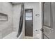 Bright bathroom with tub, updated tile and modern fixtures at 5882 Marlberry Dr, Orlando, FL 32819
