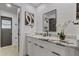 Bathroom featuring marble counter tops, and modern black hardware at 5882 Marlberry Dr, Orlando, FL 32819