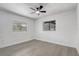 Bedroom with freshly painted white walls, wood flooring and natural light at 5882 Marlberry Dr, Orlando, FL 32819
