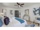Bright bedroom featuring modern decor, stylish furniture, ceiling fan, and fresh paint at 5882 Marlberry Dr, Orlando, FL 32819