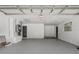 Spacious garage with painted floor and room for storage at 5882 Marlberry Dr, Orlando, FL 32819