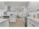 Contemporary kitchen featuring stainless steel appliances and modern cabinetry at 5882 Marlberry Dr, Orlando, FL 32819