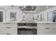 Modern kitchen boasting an electric cooktop on a marble countertop island at 5882 Marlberry Dr, Orlando, FL 32819