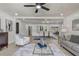 Open-concept living and dining area with modern decor and plenty of natural light at 5882 Marlberry Dr, Orlando, FL 32819