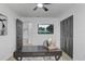 Office space with a stylish desk, closet space and a flat screen TV at 5882 Marlberry Dr, Orlando, FL 32819