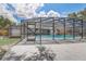 Enjoy a screened-in pool with concrete patio, perfect for entertaining or relaxing on sunny days at 5882 Marlberry Dr, Orlando, FL 32819