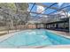 Beautiful pool with a full screen enclosure to keep the bugs away while you enjoy backyard swimming at 5882 Marlberry Dr, Orlando, FL 32819