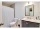 Bathroom featuring a vanity with gray cabinets, a large mirror, and a shower with a curtain at 641 Maple Oak Cir # 101, Altamonte Springs, FL 32701