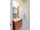 Modern bathroom with floating vanity, unique backsplash and a decorative mirror at 641 Maple Oak Cir # 101, Altamonte Springs, FL 32701