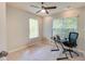 Office space with a modern black desk, chair, and two bright windows creating a great at home work space at 641 Maple Oak Cir # 101, Altamonte Springs, FL 32701