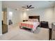 Large bedroom featuring neutral walls, a ceiling fan and carpet, including a large dresser at 641 Maple Oak Cir # 101, Altamonte Springs, FL 32701