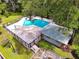 Community pool with ample seating, fenced perimeter, and a bath house at 641 Maple Oak Cir # 101, Altamonte Springs, FL 32701