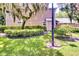 Landscaped front yard, showcasing lush greenery and inviting walkway to the home's entrance at 641 Maple Oak Cir # 101, Altamonte Springs, FL 32701
