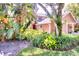 Charming home featuring lush tropical landscaping and a two-car garage at 641 Maple Oak Cir # 101, Altamonte Springs, FL 32701