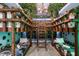 A whimsical bunkroom features a unique, double-stacked bunk bed and a playful jungle theme at 8913 Coconut Breeze Dr, Kissimmee, FL 34747