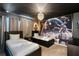 A modern bedroom with a Star Wars theme boasts a unique mural and twin beds at 8913 Coconut Breeze Dr, Kissimmee, FL 34747