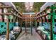 Unique bedroom with a jungle theme, featuring custom bunk beds, creative decor, and playful design elements at 8913 Coconut Breeze Dr, Kissimmee, FL 34747