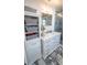 Bathroom featuring a glass shower, vanity with storage and a built in shelf at 901 Candle Berry Rd, Orlando, FL 32825