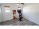 Bright bedroom features luxury vinyl plank flooring, neutral paint and natural light at 901 Candle Berry Rd, Orlando, FL 32825