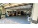 The garage features a gray floor and lots of room for storage and work at 901 Candle Berry Rd, Orlando, FL 32825