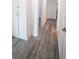 Hallway featuring luxury vinyl plank flooring and closet at 901 Candle Berry Rd, Orlando, FL 32825