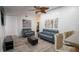Modern living room with neutral-toned furniture, accent art, and an open floor plan at 901 Candle Berry Rd, Orlando, FL 32825