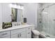 Modern bathroom with stylish vanity, sleek fixtures, and a glass-enclosed shower at 9067 Stonebury Way, Orlando, FL 32832