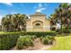 Welcoming entrance to The Enclave at Moss Park, featuring lush landscaping and an attractive building at 9067 Stonebury Way, Orlando, FL 32832
