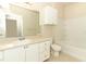 Well-lit bathroom with a vanity, mirror, and shower-tub combo at 911 N Orange Ave # 143, Orlando, FL 32801
