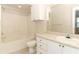 Bathroom features a vanity and shower over tub at 911 N Orange Ave # 143, Orlando, FL 32801