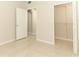 Bedroom with a door leading to a closet with shelving at 911 N Orange Ave # 143, Orlando, FL 32801