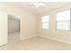 Bedroom with tile floor, ceiling fan and natural light from two windows at 911 N Orange Ave # 143, Orlando, FL 32801