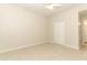 Bedroom features tile floors, ceiling fan and closet with double doors at 911 N Orange Ave # 143, Orlando, FL 32801