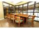 Bright conference room with large windows and a wooden table at 911 N Orange Ave # 143, Orlando, FL 32801