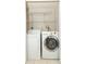 Laundry room showcasing the washer and dryer, with wire shelving at 911 N Orange Ave # 143, Orlando, FL 32801