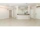 Spacious living room with tile flooring, neutral color palette, and an open-concept design at 911 N Orange Ave # 143, Orlando, FL 32801