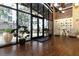Community building lobby with seating, plants, and a view of the exterior at 911 N Orange Ave # 143, Orlando, FL 32801