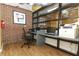 Well-equipped work space area with computer, printer and comfortable chair at 911 N Orange Ave # 143, Orlando, FL 32801