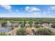 Backyard patio aerial shot with outdoor seating and landscape at 1041 Cherry Valley Way, Orlando, FL 32828